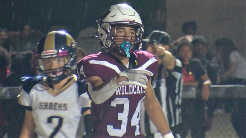 Johnson City wide receiver Fenesse Morales (34) celebrates a touchdown in the second half of a...