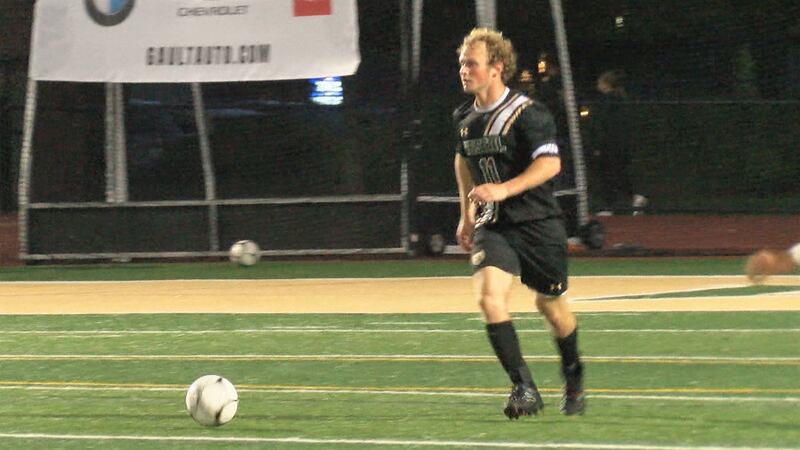 A Vestal boys soccer play prepares to kick the ball in a high school game against Union-Endicott.