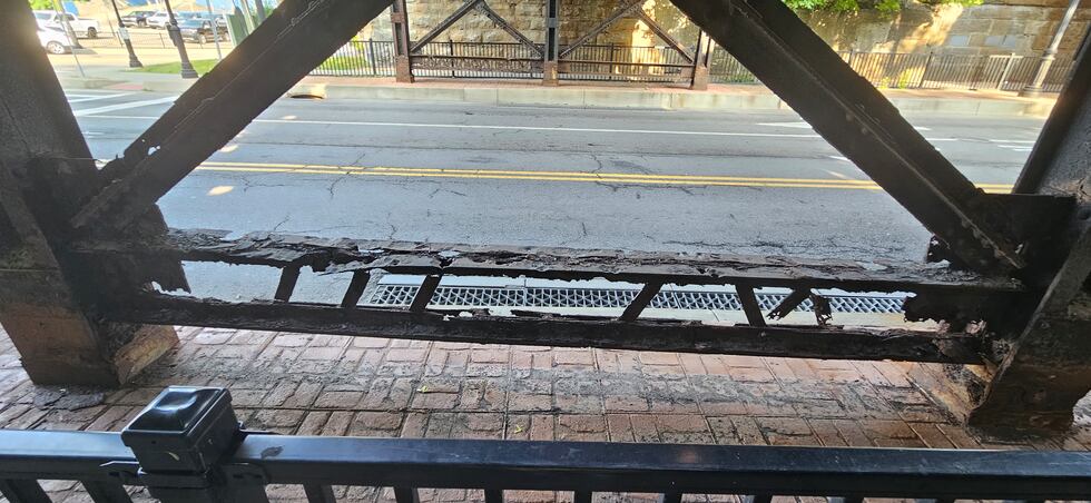 Damage on a steel railroad bridge located on Front Street