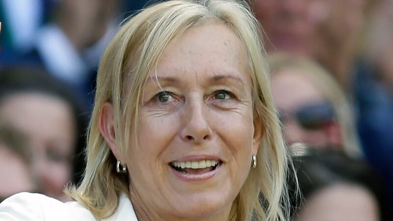 FILE - Tennis great Martina Navratilova is shown in the royal box on Centre Court at the All...