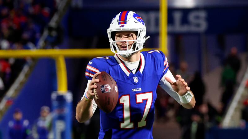 Buffalo Bills quarterback Josh Allen (17) looks to pass during the first half of an NFL...