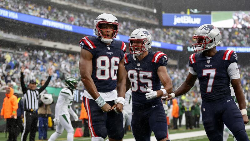New England Patriots tight end Pharaoh Brown (86) celebrates with teammates after scoring a...