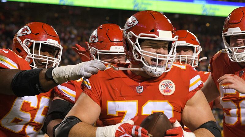 FILE - Kansas City Chiefs lineman Nick Allegretti celebrates after scoring a touchdown against...