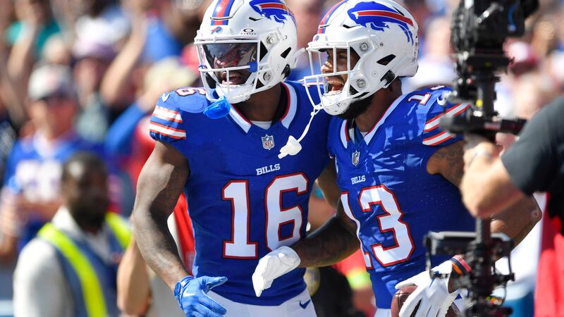 Buffalo Bills wide receiver Gabe Davis (13) celebrates his touchdown with Trent Sherfield (16)...