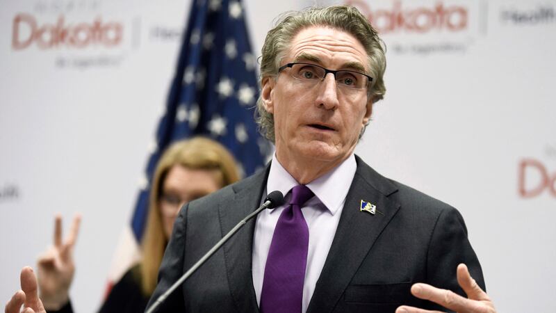 FILE - North Dakota Gov. Doug Burgum speaks at the state Capitol on April 10, 2020, in...